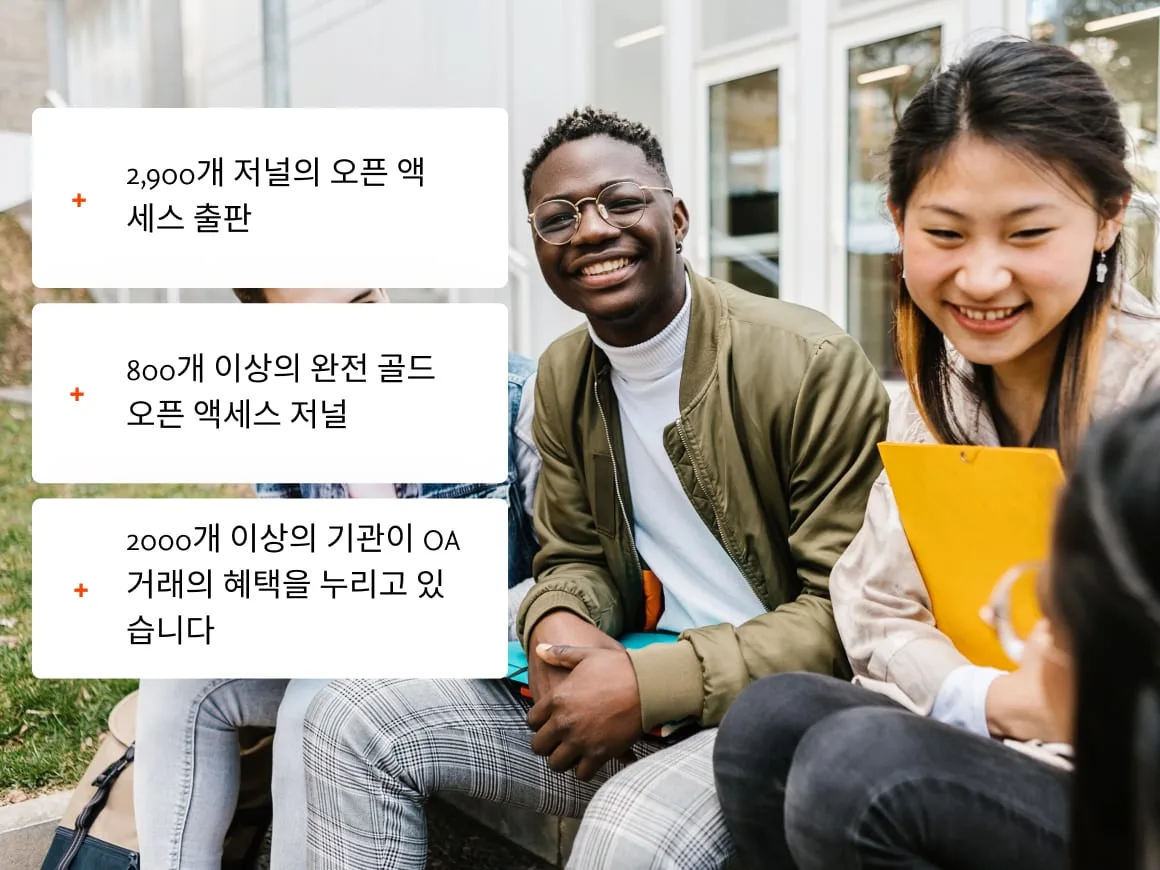 Two people working together with laptop