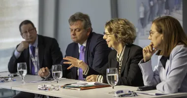 The panel ‘New measures of societal impact: From ivory tower to town square’ featured moderator Dr Arthur Ellis (left) and panelists Prof Sir Anton Muscatelli, Prof Robin Garrell and Prof Cheryl de la Rey. (Photo by Alison Bert)
